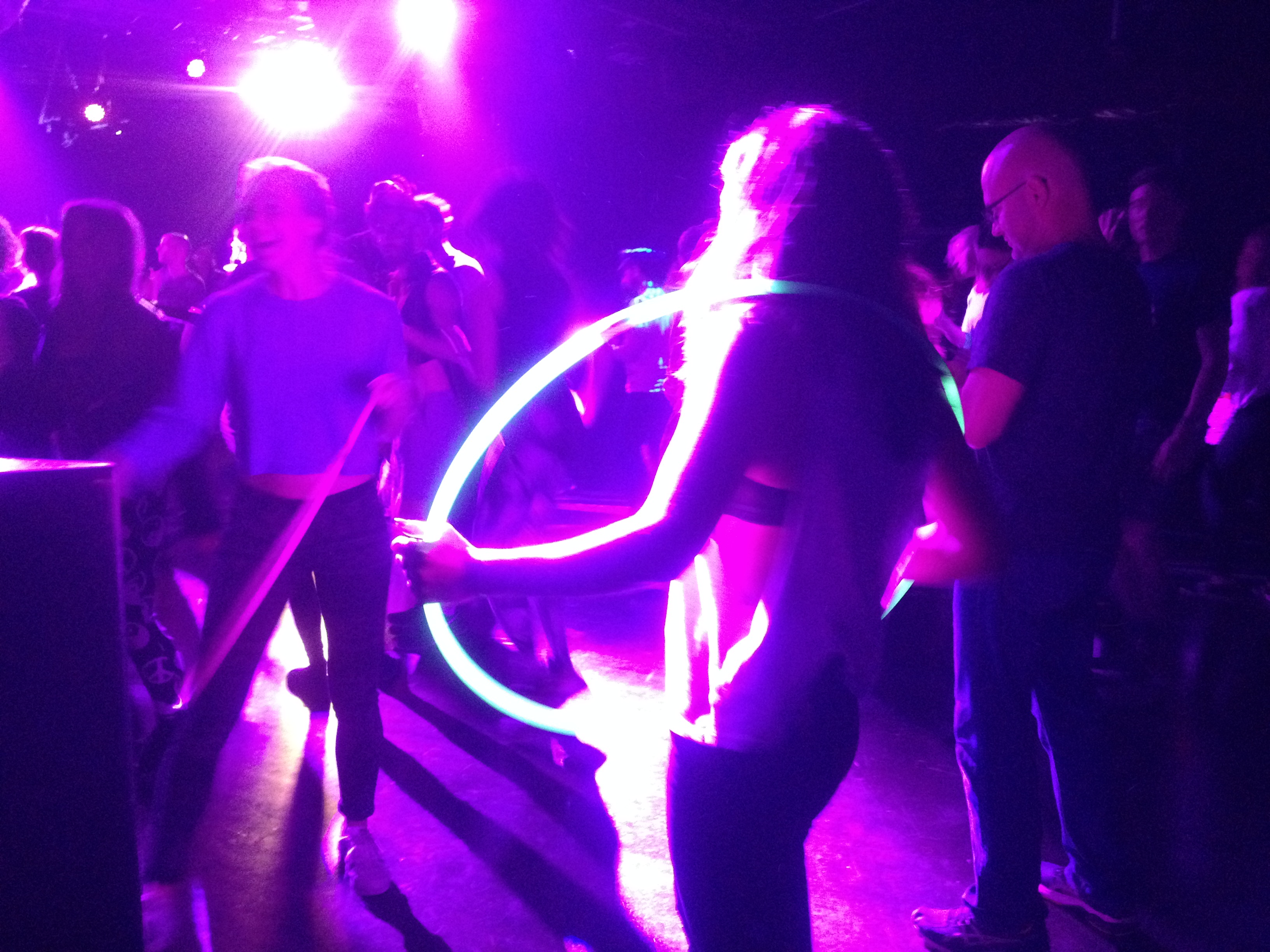 girl with hula hoop on dance floor Morning Gloryville
